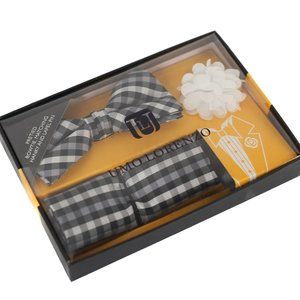 Pretied black bowtie, matching hanky and white lapel pin